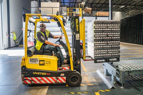 Pallet Stacker Trucks Benefits To Businesses